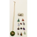 A set of agate pendants, nephrite jade pendant set with a 14k gold horse, silver earrings and a