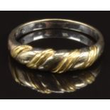 An 18ct gold bi-coloured ring, size N, 2.8g