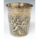 Continental white metal beaker with embossed scene of Christ carrying the cross, height 8.5cm,