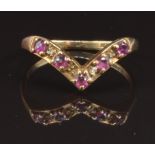 A 9ct gold ring set with rubies and diamonds, size L, 1.5g
