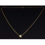 An 18ct gold necklace set with a round cut diamond of approximately 0.45ct, length 40cm, 5.8g