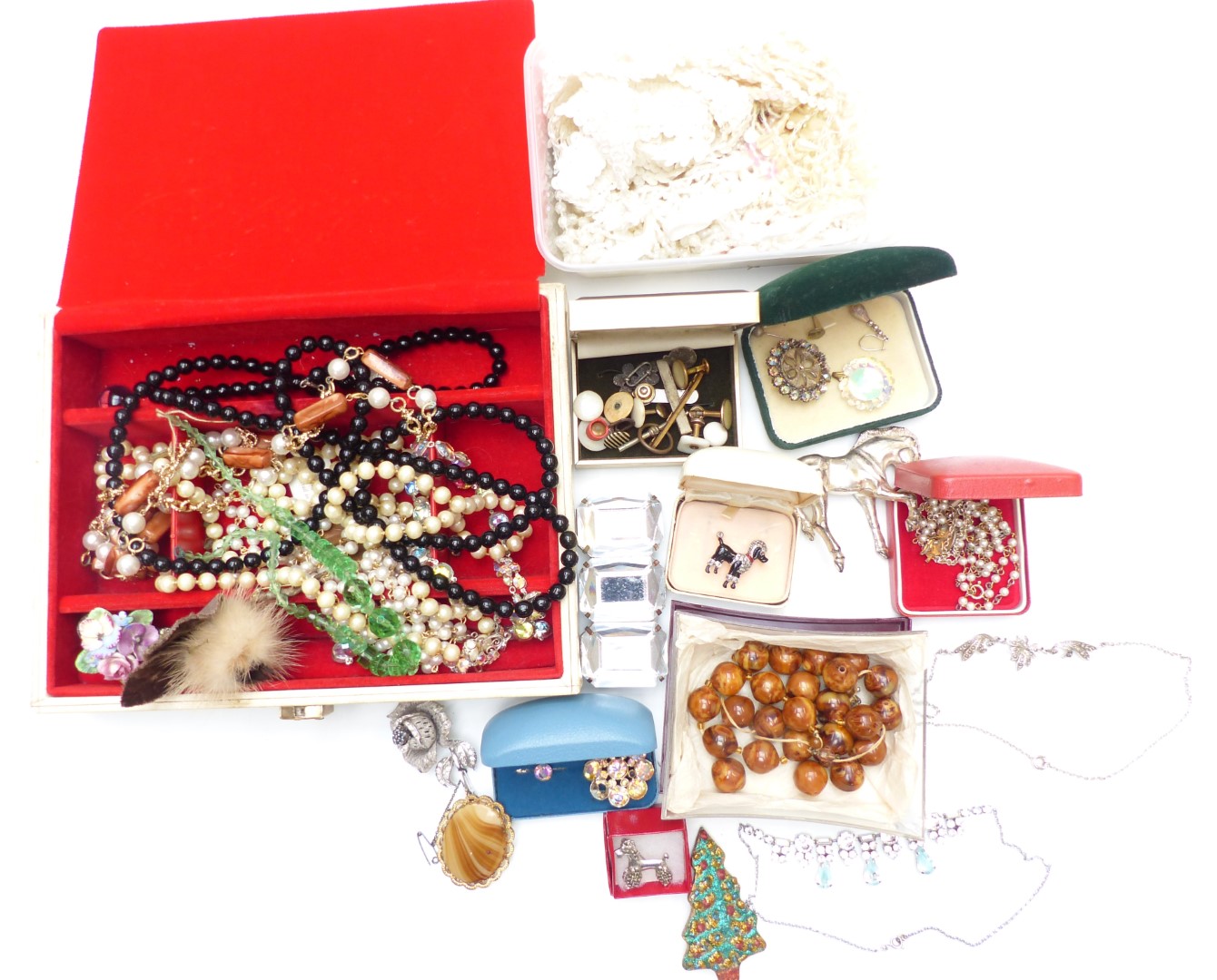 A collection of jewellery including beads, silver brooch, diamanté necklace, etc