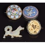 A micro mosaic brooch, a mother of pearl dog and a brooch set with carved ivory