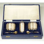 Cased retro three piece cruet set with bark effect decoration, Birmingham 1970/71, maker Deakin &