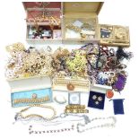 A collection of costume jewellery including earrings, chains, filigree and diamanté necklaces,
