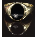 A 9ct gold ring set with onyx and a diamond, size 2, 4.1g