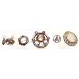 A group of silver jewellery including Victorian locket, brooch set with agate, fob and brooch set