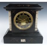 A 19thC French slate mantel clock with Roman chapter ring, beetle and poker hands and two train