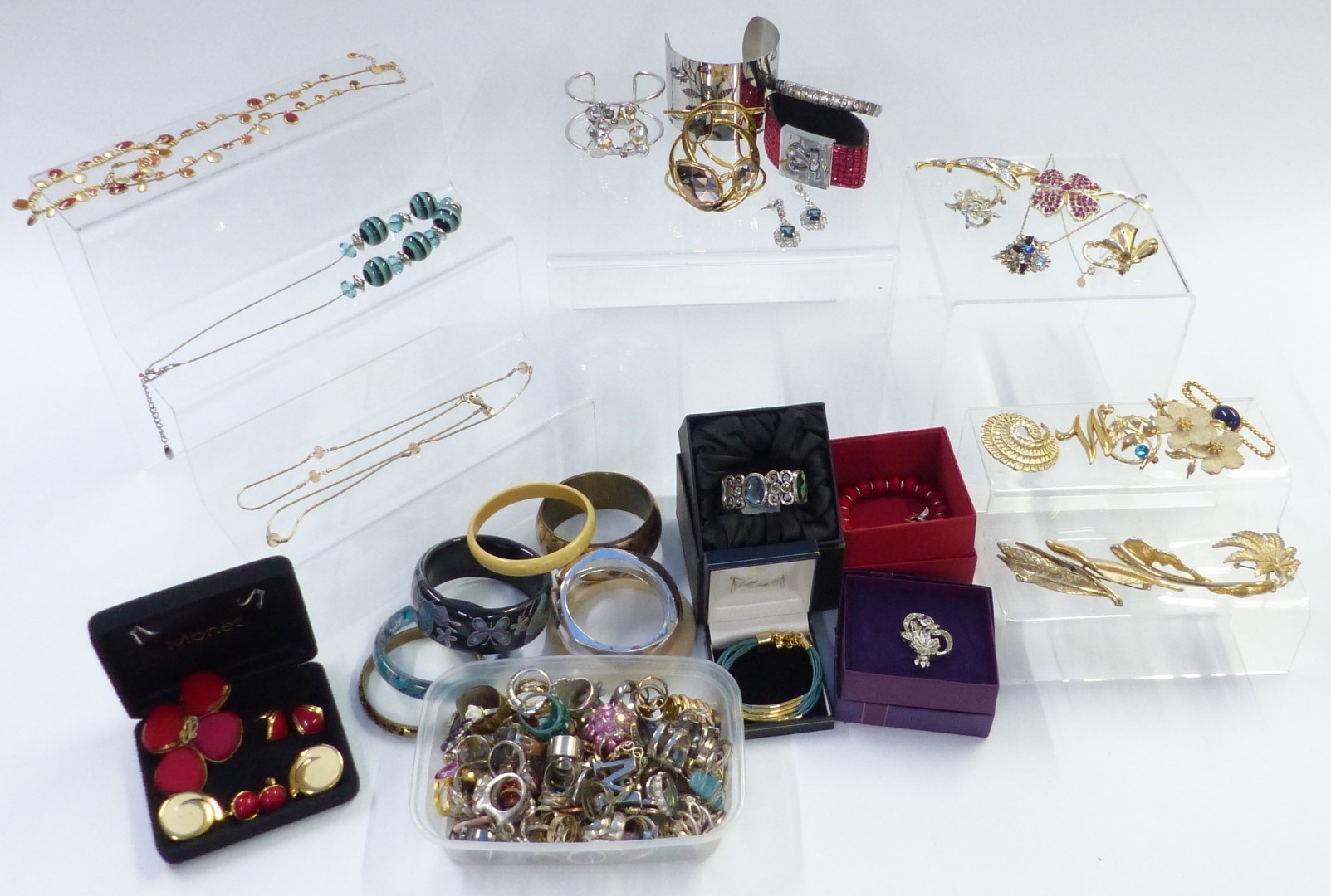 A collection of jewellery including bangles, some Swarovski; earrings; Exquisite, Sarah Coventry,