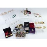 A collection of jewellery including bangles, some Swarovski; earrings; Exquisite, Sarah Coventry,
