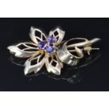 A 9ct gold brooch set with amethysts, 4 x 2.3cm, 4.7g