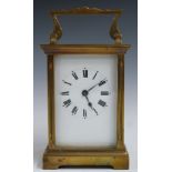 Early to mid-20thC French brass carriage clock, the enamel Roman dial with blued steel hands, the