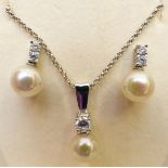 Majorica silver necklace set with a faux pearl and cubic zirconia, with matching earrings