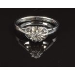 An 18ct white gold ring set with a diamond, size M, 3.2g