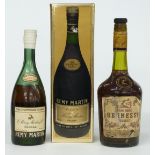 Hennessy Bras Armé Cognac 70 proof, Rémy Martin fine Champagne Cognac and a later Rémy Martin fine