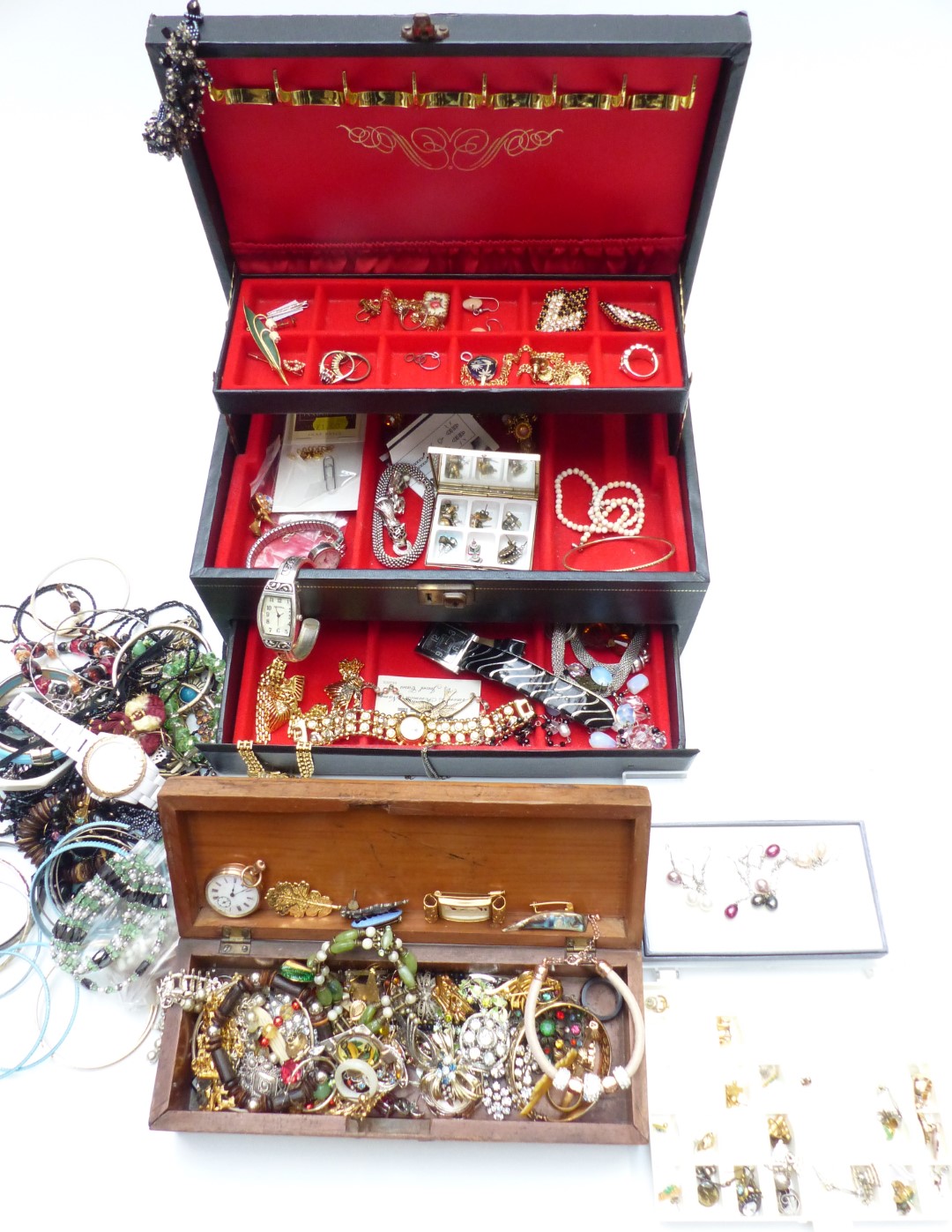 A collection of costume jewellery including gold plated pocket watch, earrings, beads, vintage