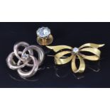 Victorian yellow metal brooch set with a diamond, a Victorian stud set with paste and a brooch