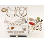 A collection of silver jewellery including locket, chains, necklaces. filigree, bracelets and