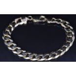 A 9ct gold curb link bracelet, 28g