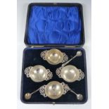 Cased Edward VII set of four hallmarked silver salts with pieced handles, Sheffeld 1901, maker