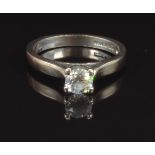 An 18ct white gold ring set with a round cut diamond of approximately 0.46ct, size L, 3.9g