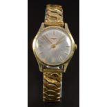 Longines 14ct gold gentleman's wristwatch ref. 6747 with gold hands and hour markers, silver dial