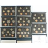 Eight Royal Mint UK proof coinage deluxe case sets 1987-1994, with certificates