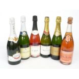 Six bottles of Champagne and sparkling wine including Nicolas Feuillatte rosé and Montcadi Cava