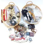 A collection of costume jewellery including brooches, necklaces, bracelets, etc