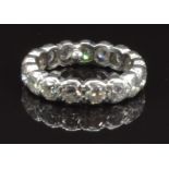 An 18ct white gold eternity ring set with 17 round cut diamonds each approximately 0.27ct, total