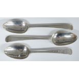 Three Georgian bright cut hallmarked silver table spoons comprising one pair London 1777, maker