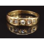 Victorian 18ct gold ring set with five rose cut diamonds, size Q, 3.9g