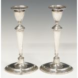 Pair of Edward VII Georgian style hallmarked silver candlesticks, Sheffield 1905, maker Thomas A