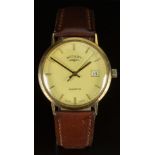 Rotary 9ct gold gentleman's wristwatch with date aperture, gold hands and baton markers, champagne