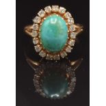 Early 19thC yellow metal ring set with a turquoise cabochon surrounded by diamonds, size K, 4.5g