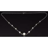 A 9ct white gold necklace set with pearls, 2.8g