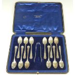 Case of 12 hallmarked silver teaspoons and tongs, weight 201g