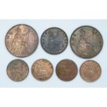 Victorian halfpenny 1865 uncirculated, together with four farthings 1886,1875 H, 1895 and 1880,