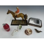 Horse and jockey table lighter, boxed Penguin Aurora 45 novelty lighter formed as a pistol,