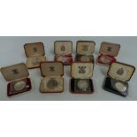 Eight various Royal Mint proof crowns, to include Gibraltar, Isle of Man, cased no certificates