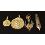 Three yellow metal pendants and a 14ct gold nib