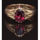 A 9ct gold ring set with a faux garnet, size I, 3.8g