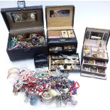 A collection of costume jewellery including brooches, necklaces, bracelets, etc