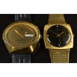 Two Revue gentleman's wristwatches one with day and date aperture, sweep centre seconds hand,