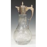 Modern hallmarked silver mounted cut glass decanter with mask decoration to spout, Sheffield 1994,