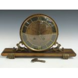 Drum cased mantel clock c1930s with Roman chapter ring and two train movement striking on a gong