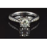 A 9ct white gold ring set with diamonds totalling approximately 0.4ct, size K, 2.6g