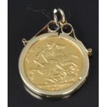 An 1891 gold full sovereign in 9ct gold mount, 9.7g