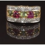 A 9ct gold ring set with rubies, sapphires and diamonds, size N, 5.3g