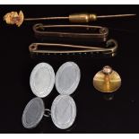 Two 9ct gold pins, 4.3g, a 9ct gold stud, 0.8g, a yellow metal stick pin set with a diamond and a